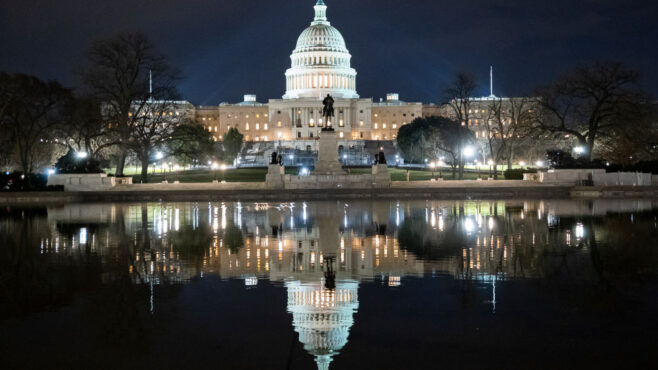 US-Capitol-at-night-with-water-reflection